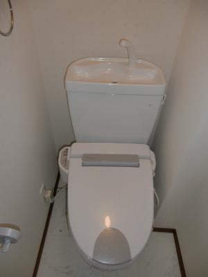 Toilet. It is a warm water washing toilet seat