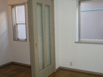 Living and room. There is a small window