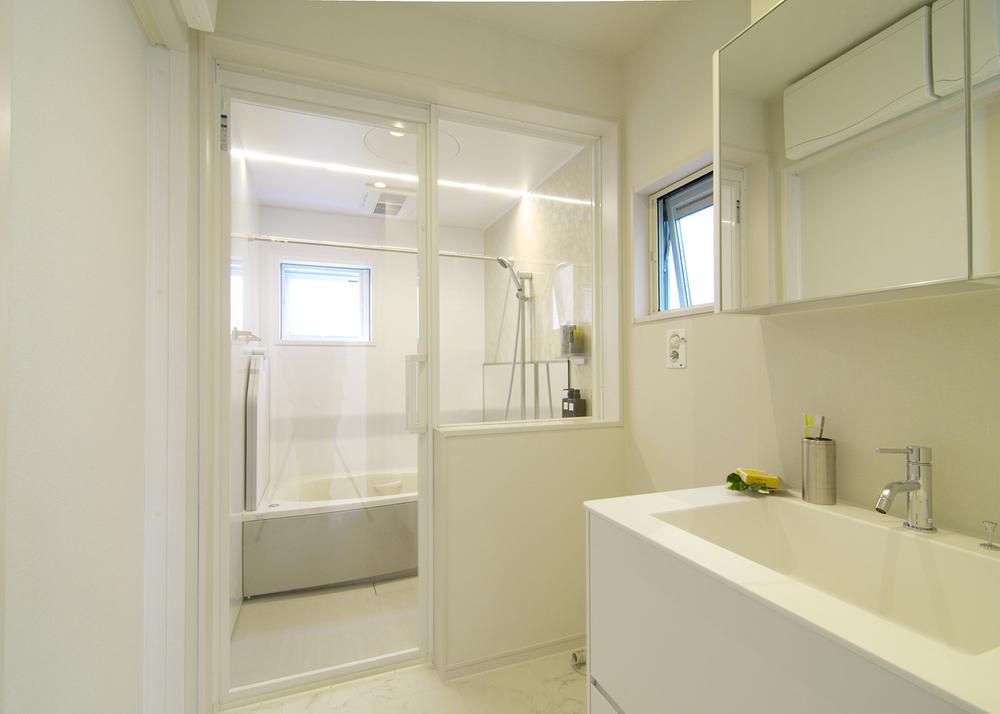 Bathroom. Adopt a glass wall. Bathroom and is felt more widely. 