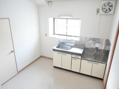 Kitchen. There is also a window to the spacious 8 quires of kitchen