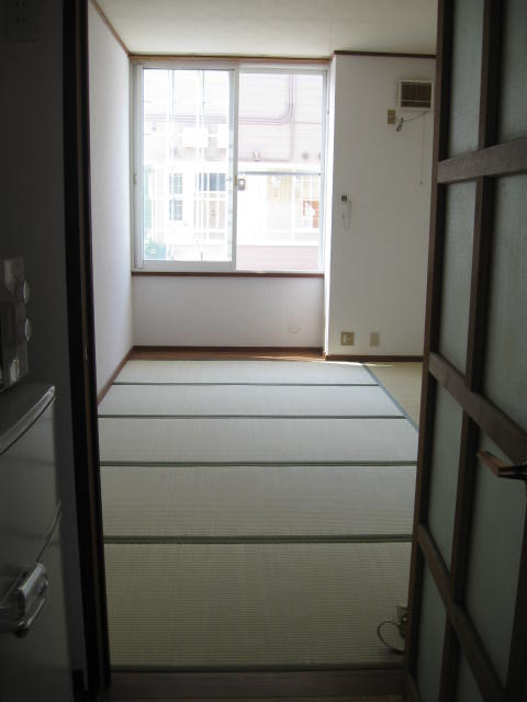 Living and room. Japanese-style room from the kitchen