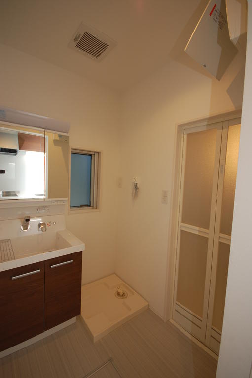 Washroom. Vanity and Laundry Area