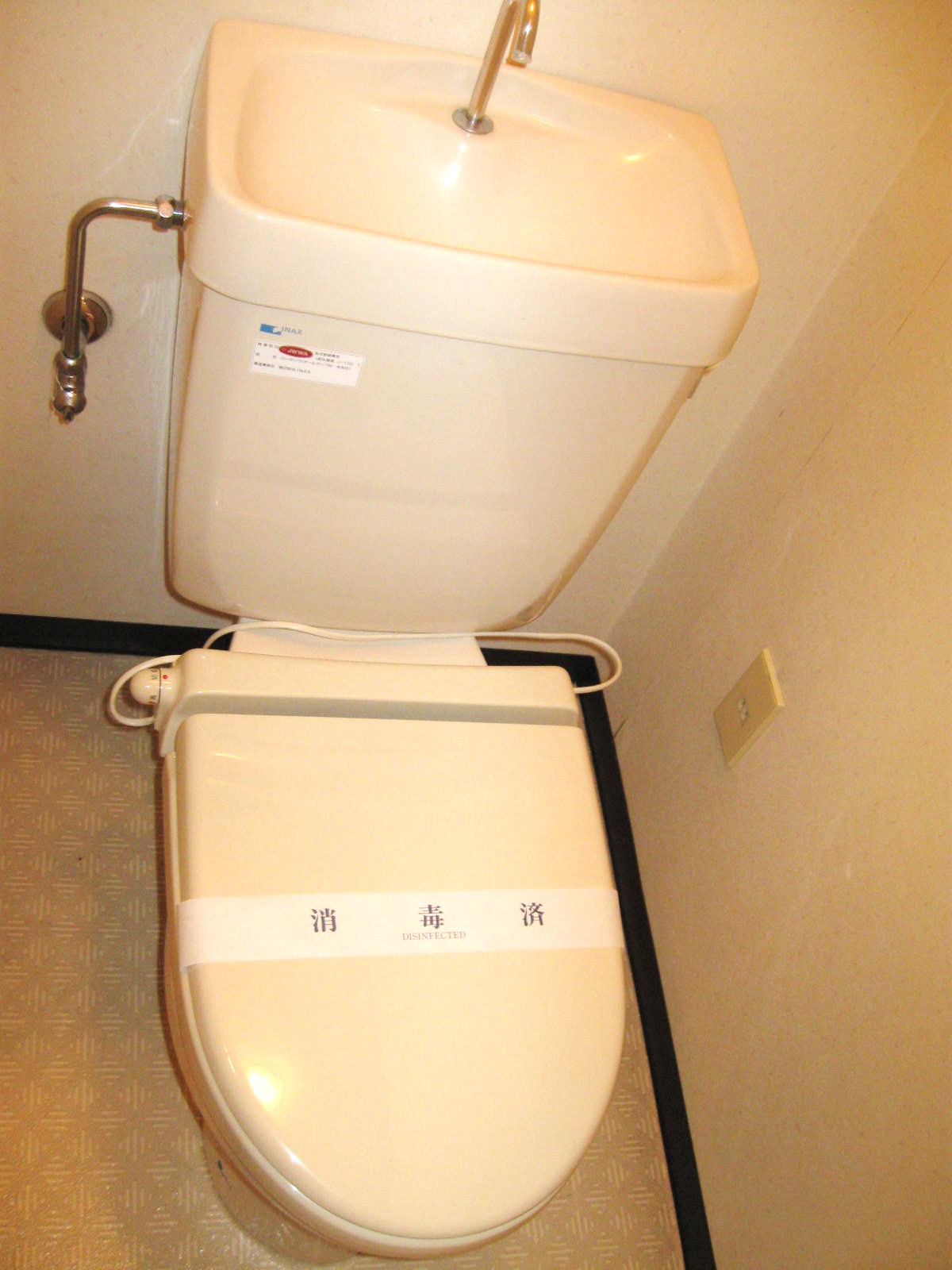 Toilet. It will be warm water washing toilet seat. 