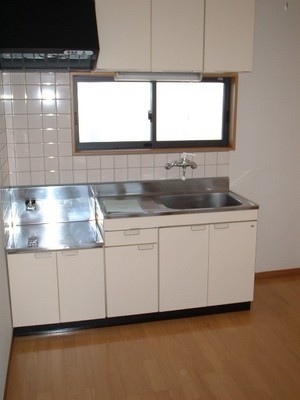 Kitchen. Two-burner gas stove is also sufficient put spread of kitchen. Also with window