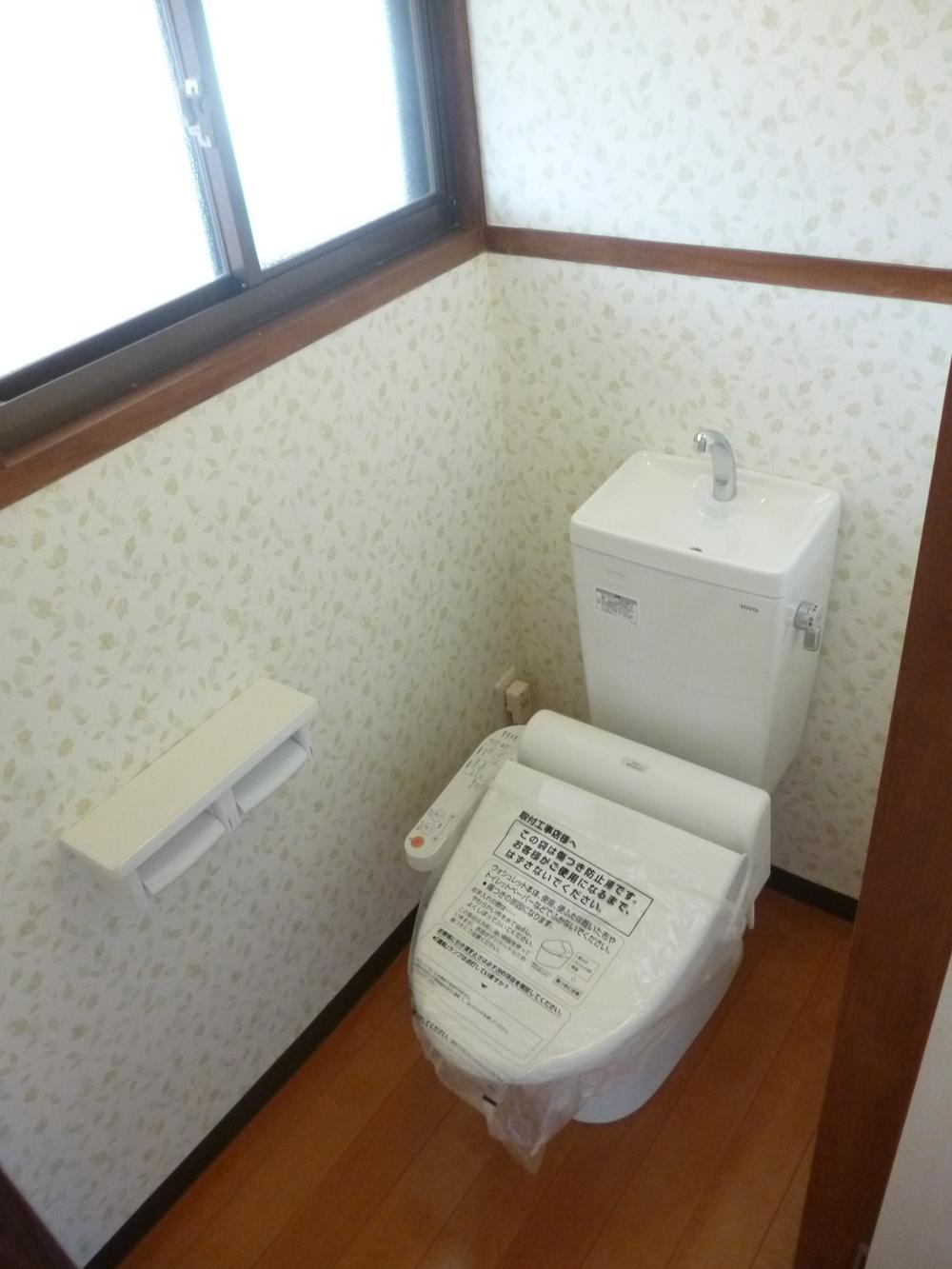 Toilet. WC of Washlet. In the toilet space using the cute wallpaper, Healed likely