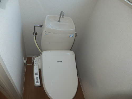 Toilet. Warm water washing toilet seat