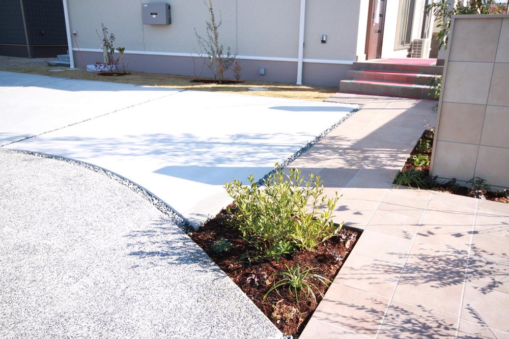 Parking lot. You can three parking in the dirt floor concrete floors.