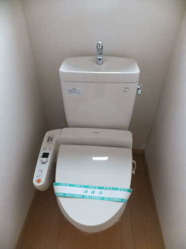 Toilet. Warm water washing toilet seat