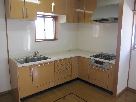 Kitchen. It is L-shaped kitchen.