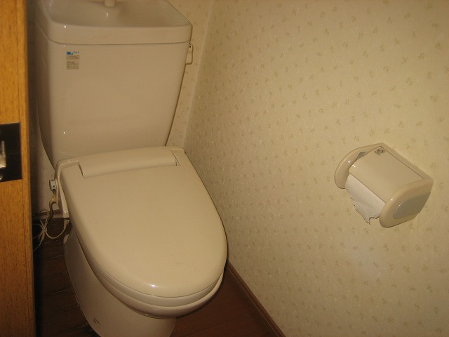 Toilet. A heated toilet seat