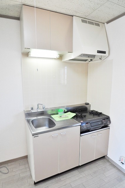 Kitchen. Facilities are to be checked! Put neatly two-burner stove!