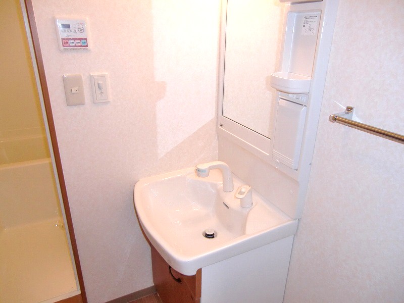 Washroom. It is a photograph of another room of the same properties