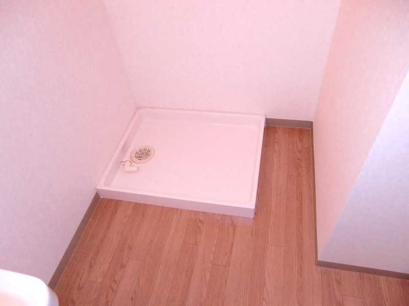 Other room space. It is a photograph of another room of the same properties