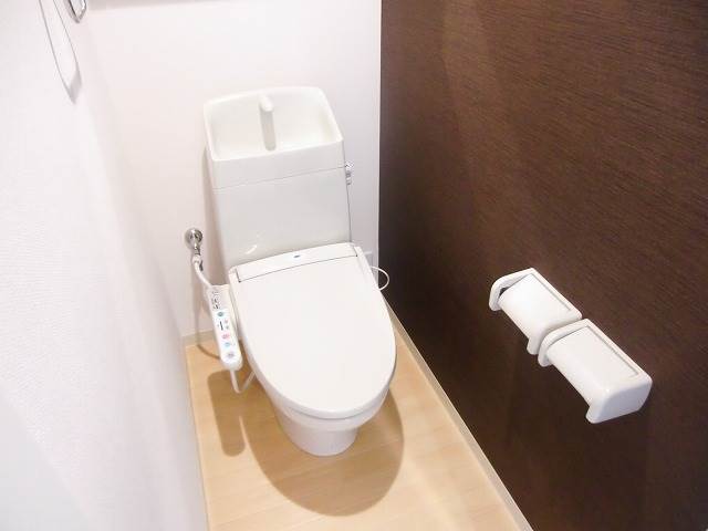 Toilet. It is similar to a photo of another property