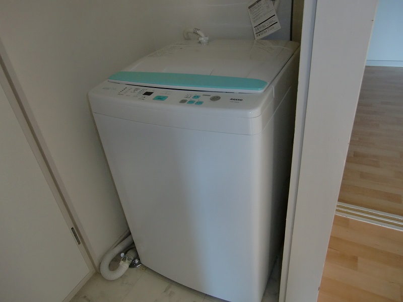 Other Equipment. Washing machine is put in a room