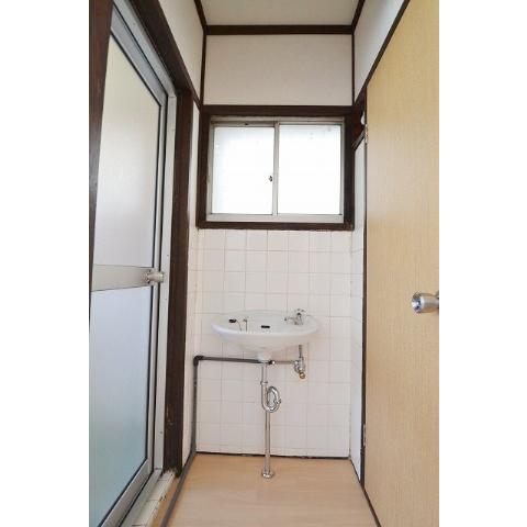 Washroom. There is a window in washroom