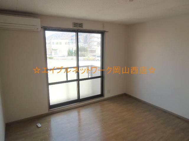 Living and room. Western-style Chaoyang is visible