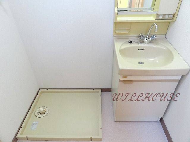 Washroom. With separate wash basin