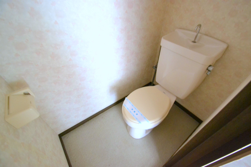 Toilet. It is a Western-style toilet with cleanliness.