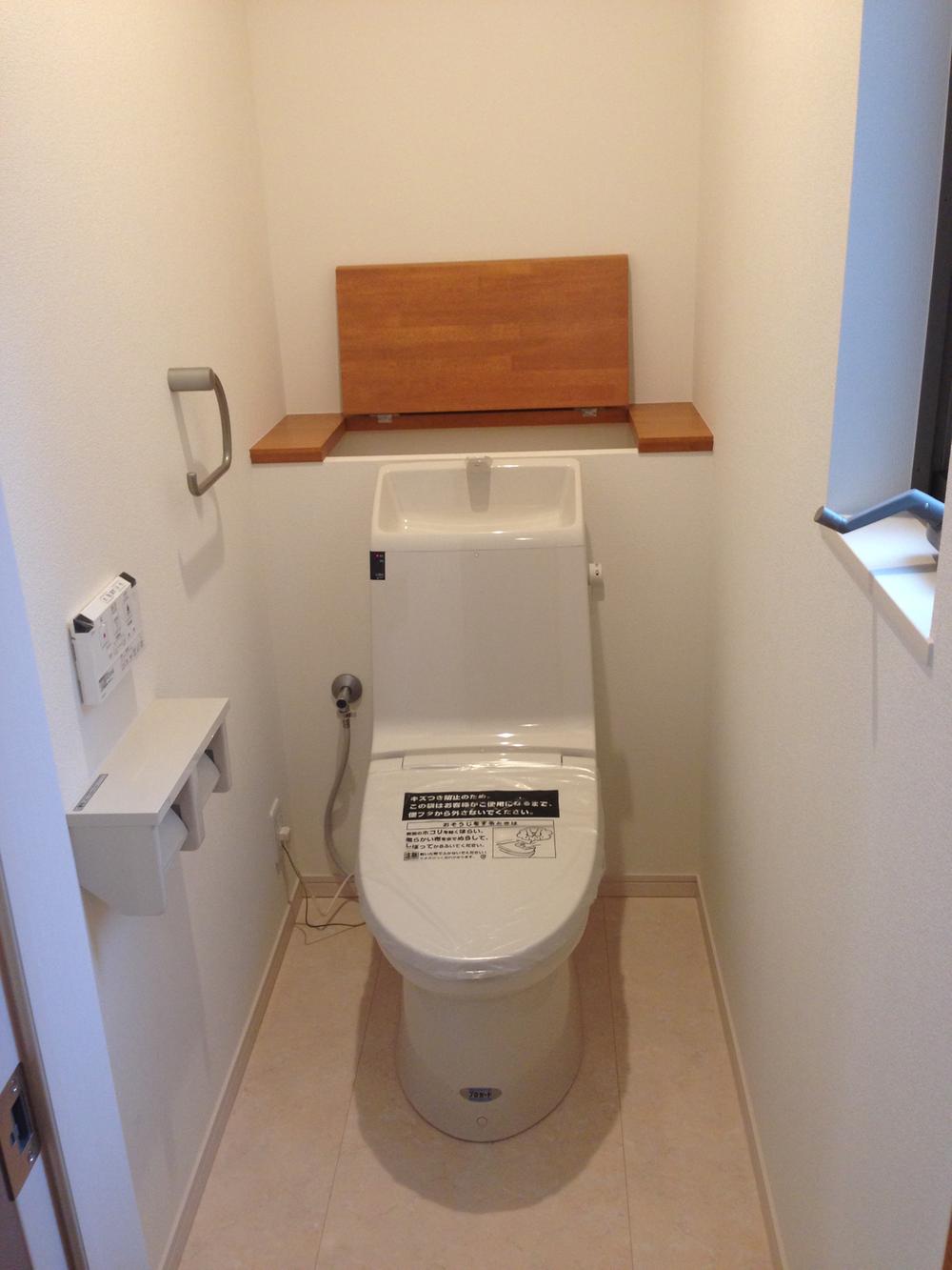 Toilet. With storage counter