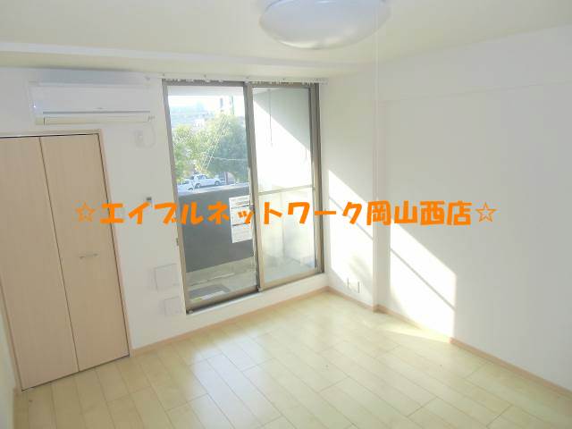 Living and room. It is a bright color of the floor