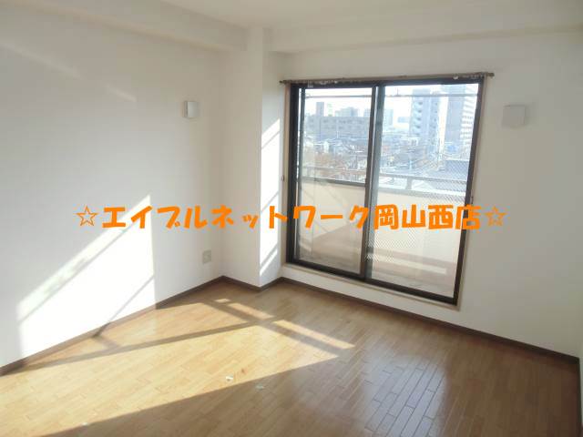 Living and room. It is spacious and bright rooms