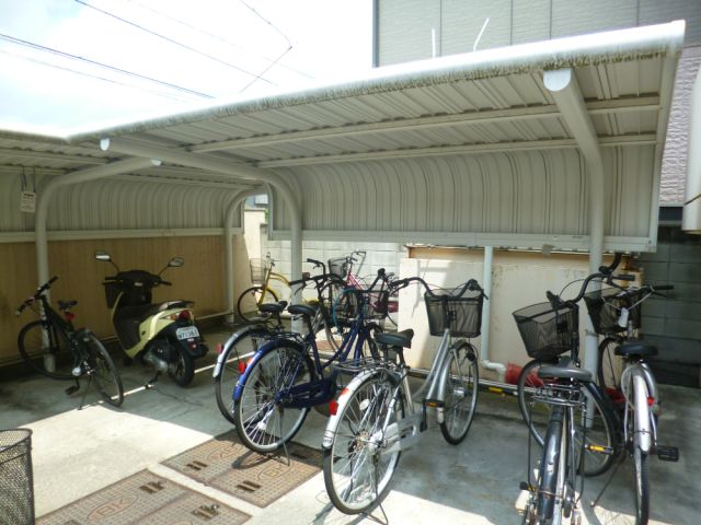 Other. It is a bicycle storage with a roof.