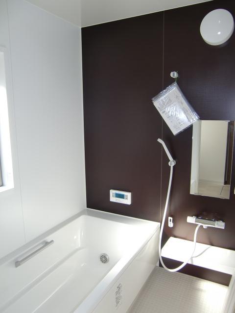 Bathroom. Wide is a bathtub. It comes with window, You can also ventilation.