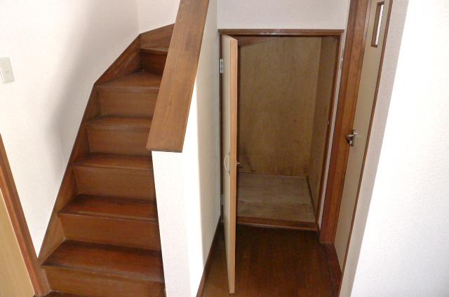 Receipt. Stairs under storage space