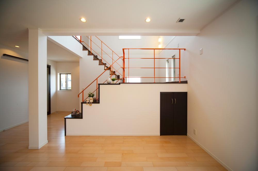 Living. Stair landing is with PC corner, Below is plenty of storage space with.