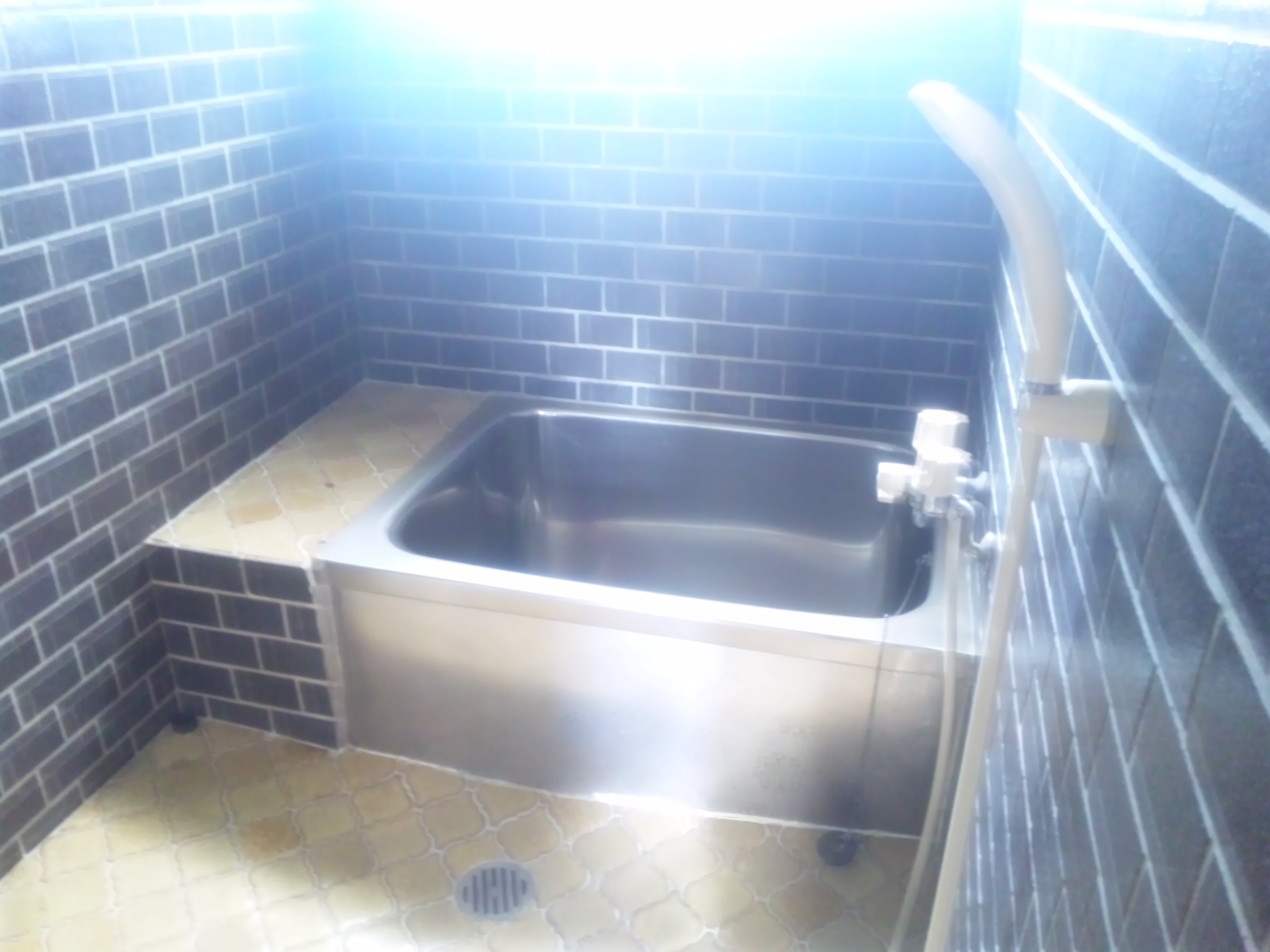Bath. Clean stainless steel bath