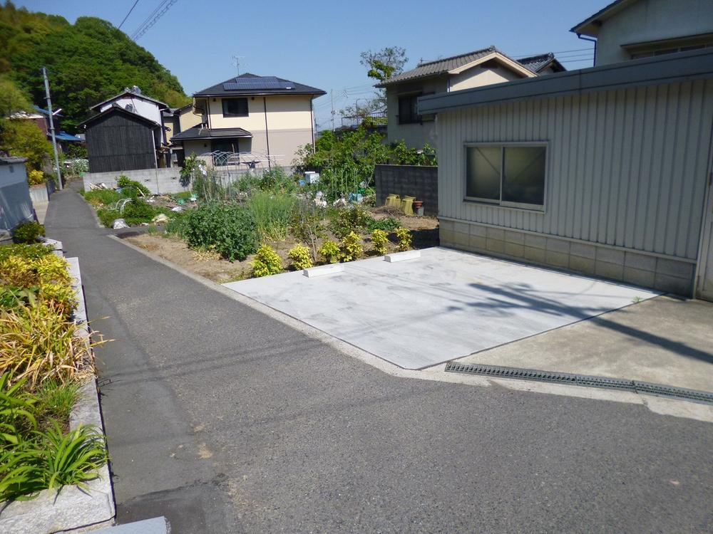 Local photos, including front road. South grounds across the building and the road is also part of the subject property