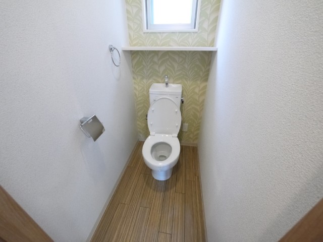 Toilet. Bright with windows toilet