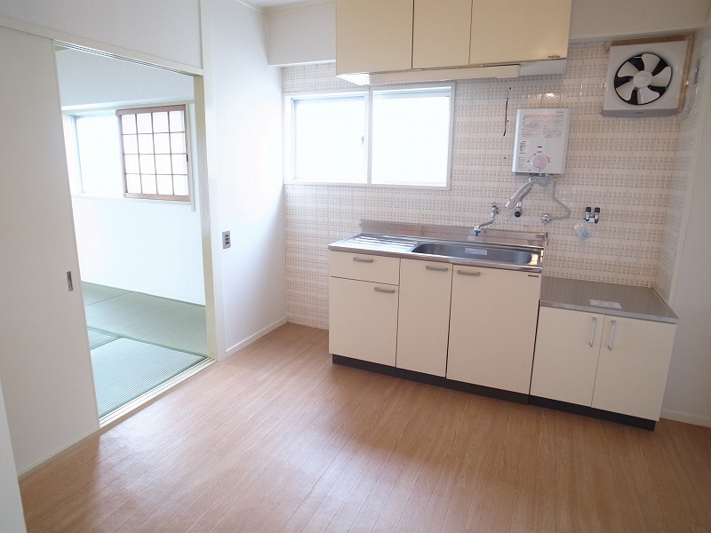 Living and room. Kitchen with morning light is plugged