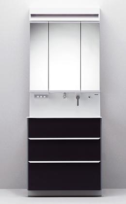 Wash basin, toilet. Image is a photograph.