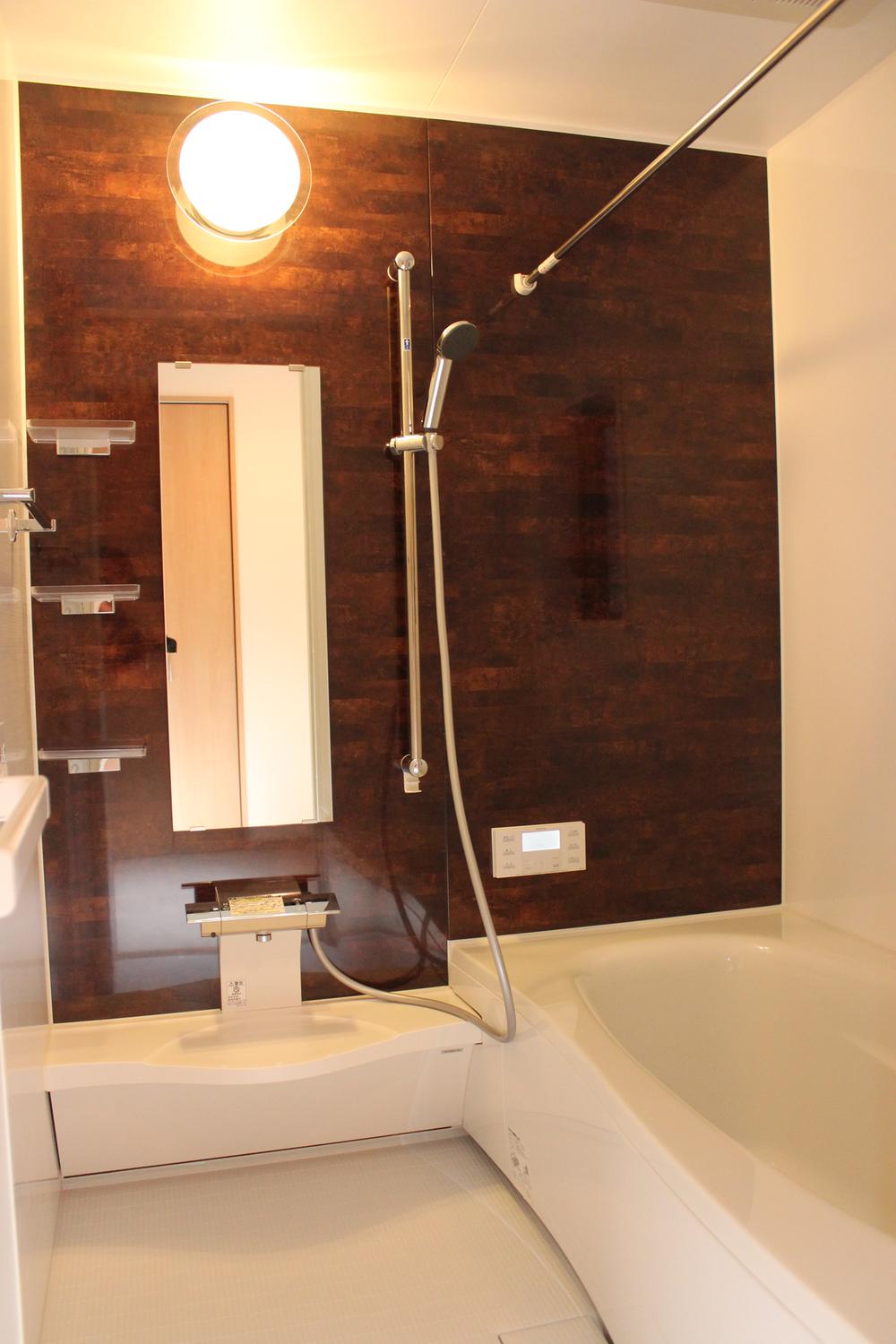 Bathroom. Photographed by local model house Round wide bathtub, Mist sauna with bathroom heating dryer also standard equipment