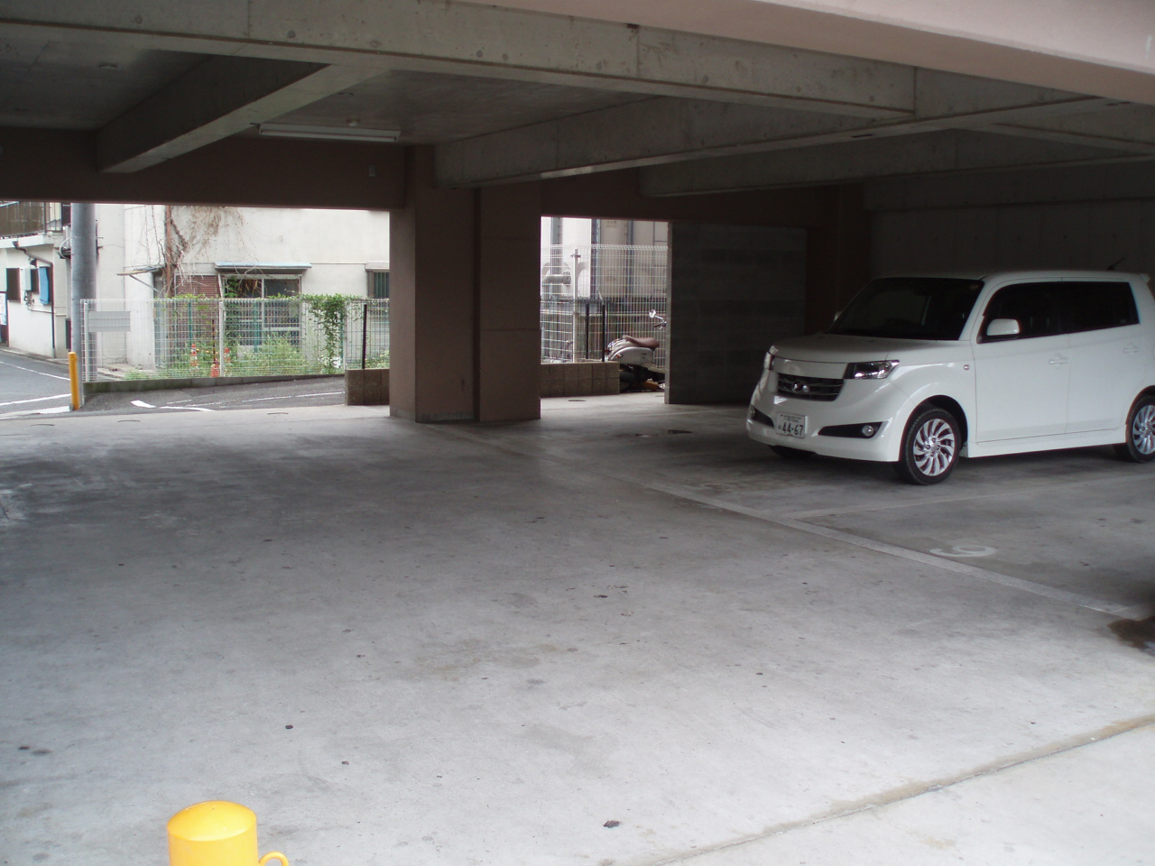 Parking lot. Mansion under parking!