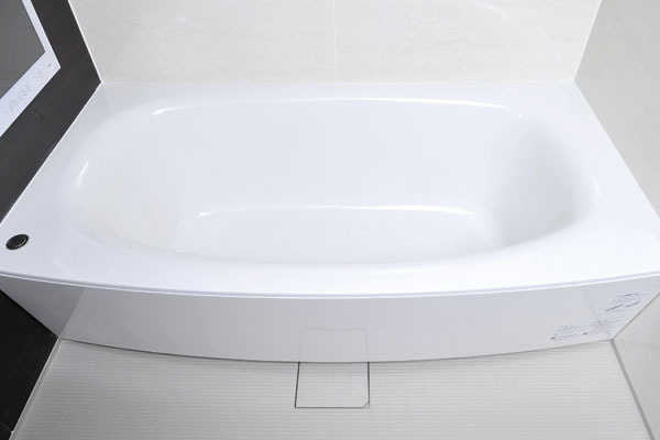 Bathing-wash room.  [Arcuate tub] In elegant design, such as the body flows into the tub, Is arcuate tub bath time can be enjoyed in a comfortable position (same specifications)