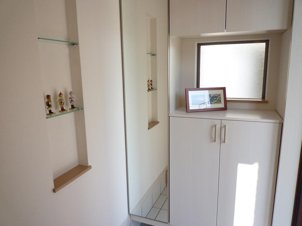 Entrance. There is also a full-length mirror in the foyer!