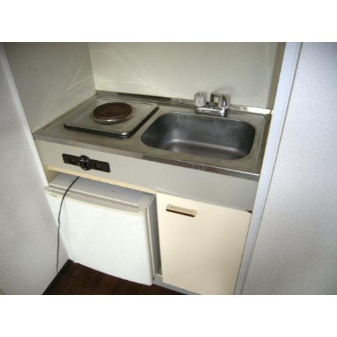 Kitchen. Mini fridge ・ Electric heating stove with. 