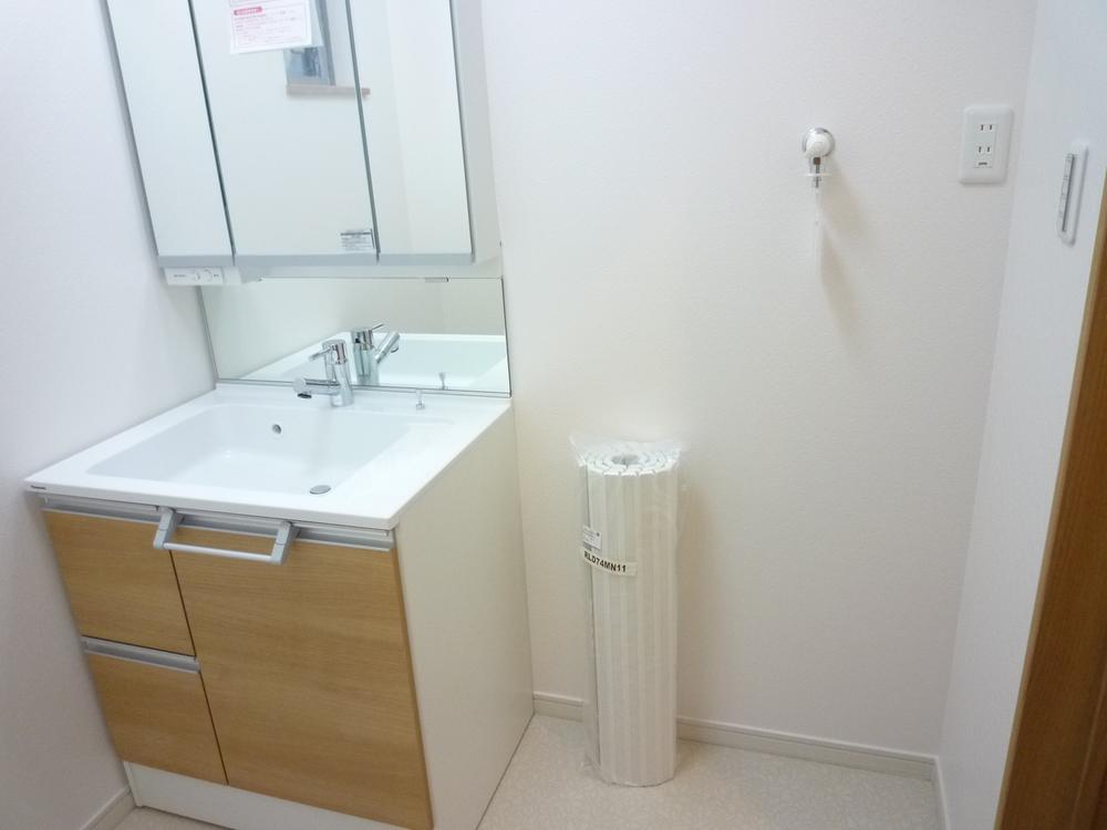 Wash basin, toilet. Panasonic also washstand