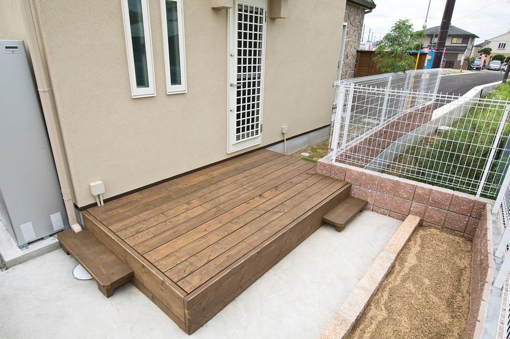 Other. Wood deck that extends from the back door will take (our enforcement example) additional cost.