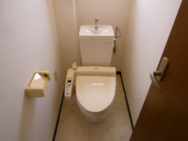 Toilet. Washlet comes with