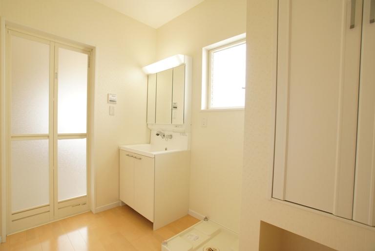 Wash basin, toilet. Shower basin and convenient storage
