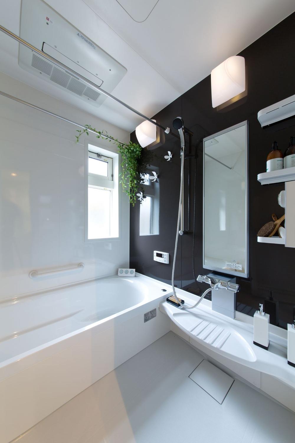 Bathroom. Brightly, Unit bus with cleanliness. Ease of cleaning is also a point.