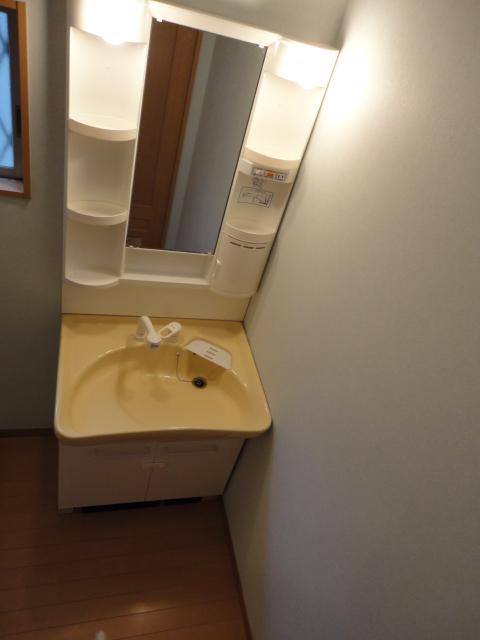 Wash basin, toilet. Shampoo with Dresser. Storage also convenient because. 
