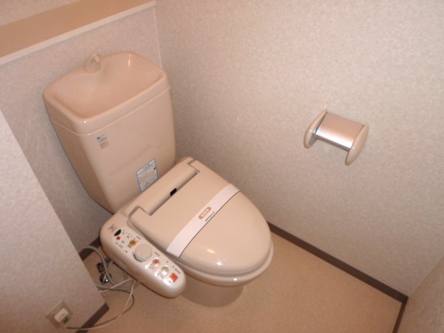 Toilet. It is clean, with Washlet