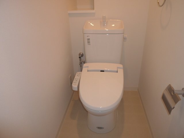 Toilet. It is heating with cleaning toilet seat.