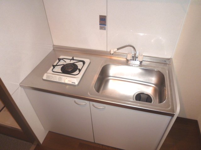 Kitchen. It comes with a gas stove 1-neck