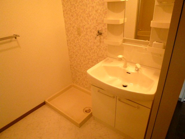 Washroom. It is a spacious dressing room. 